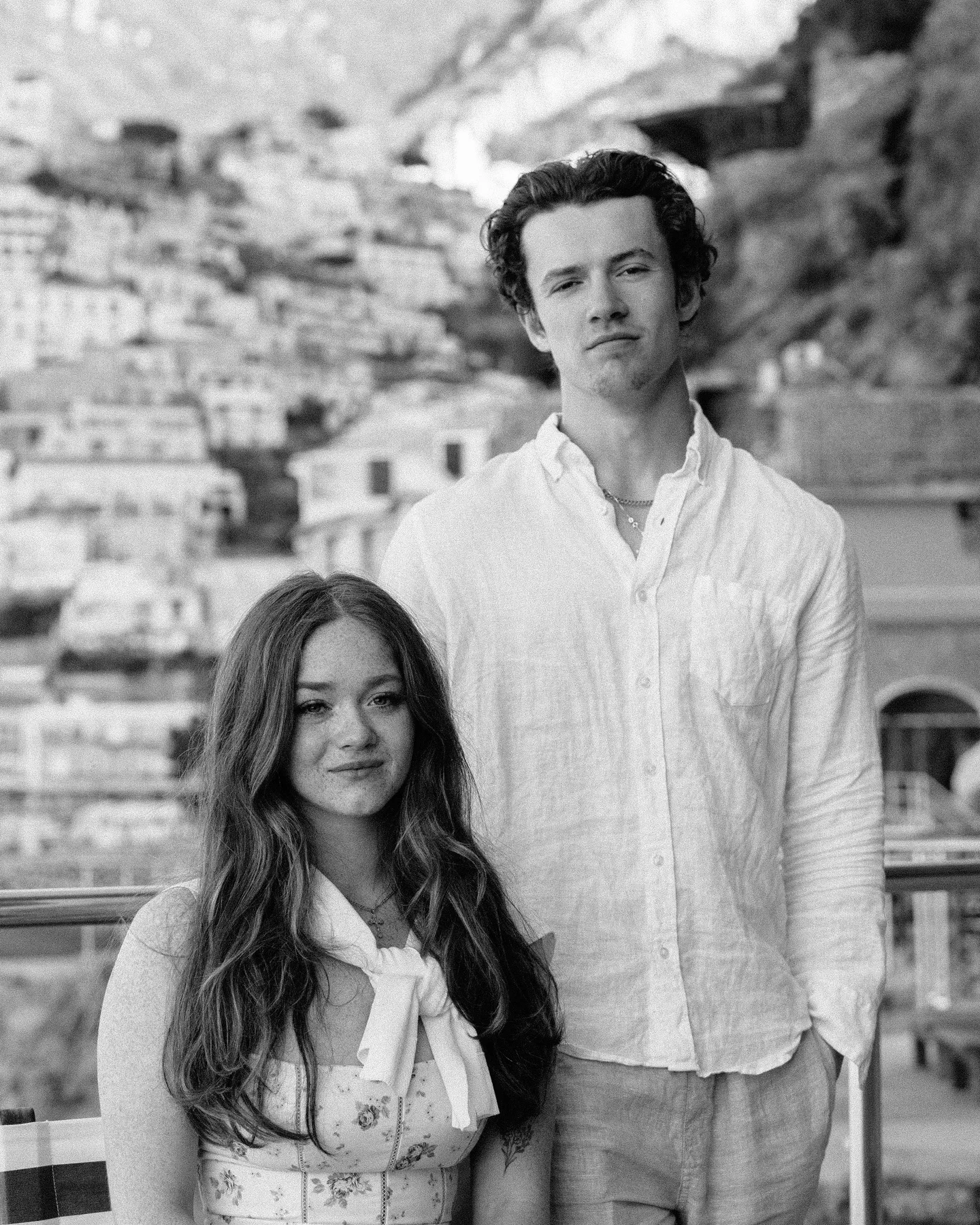 A black-and-white portrait of the couple