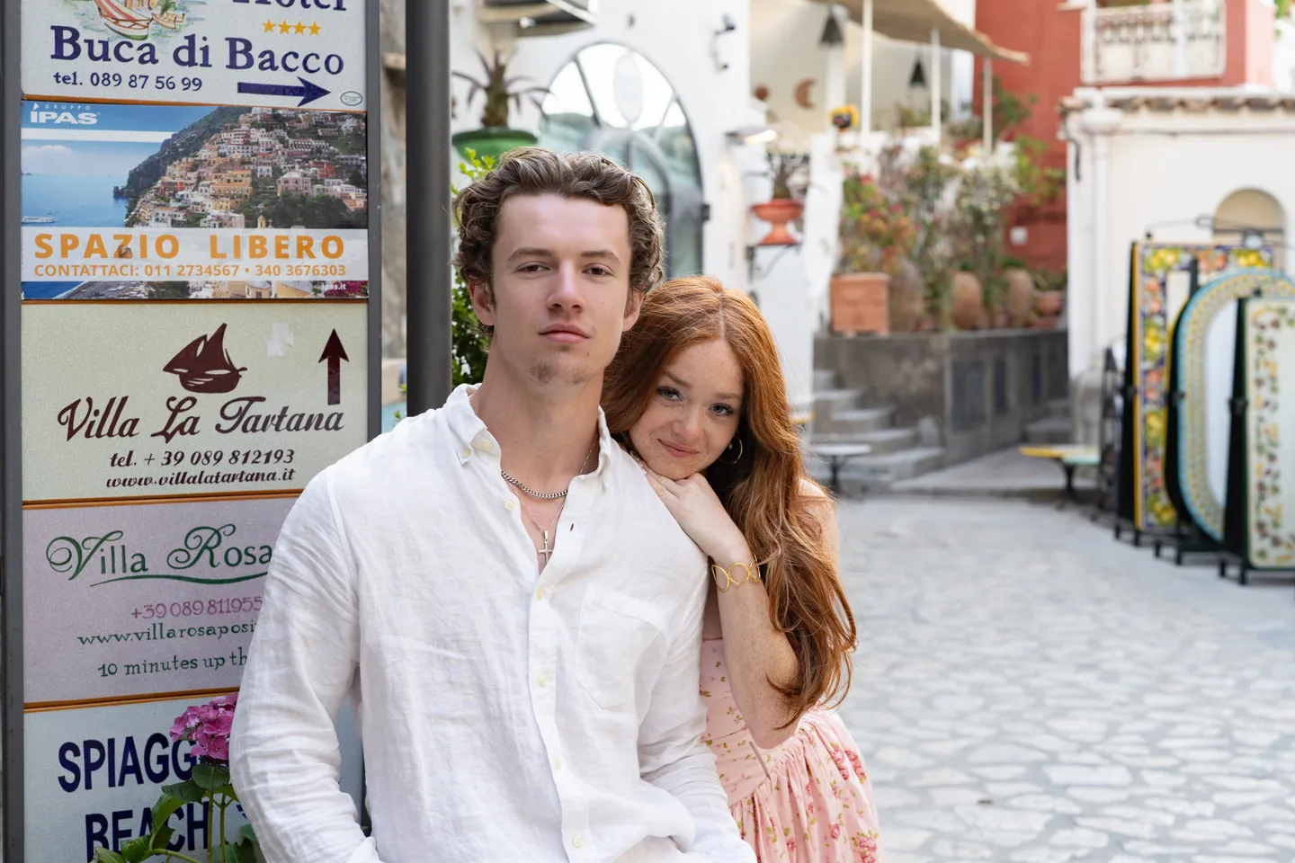 The couple embracing in a Positano lane