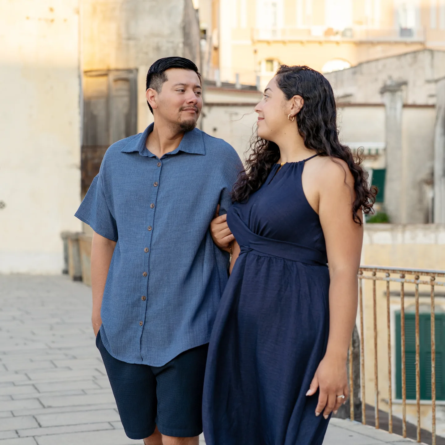 The couple sharing a smile in the morning light