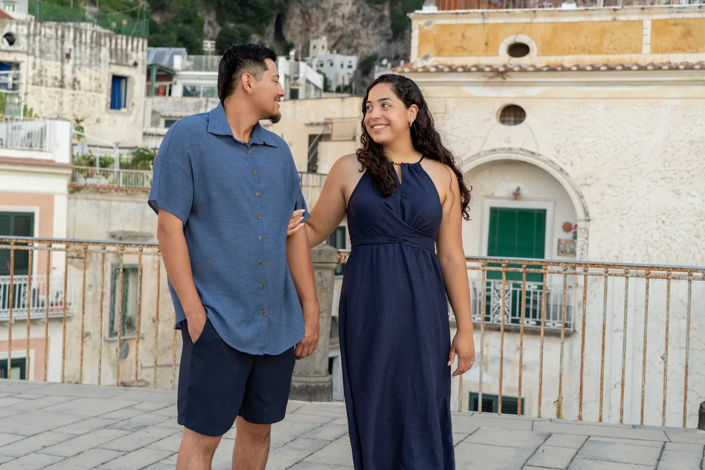 The couple standing together beside Atrani’s church