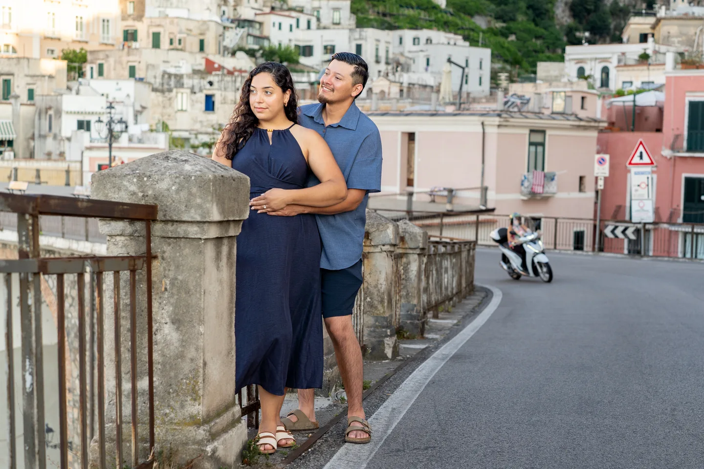 An embrace beside Atrani’s quiet road
