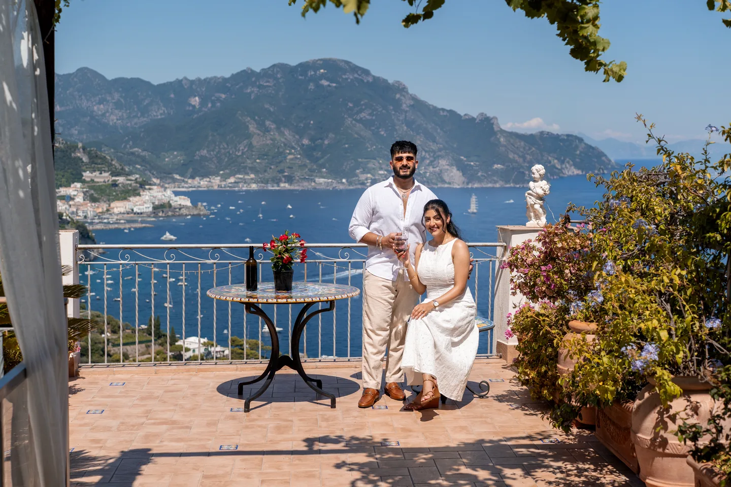A wide view of the couple and villa terrace