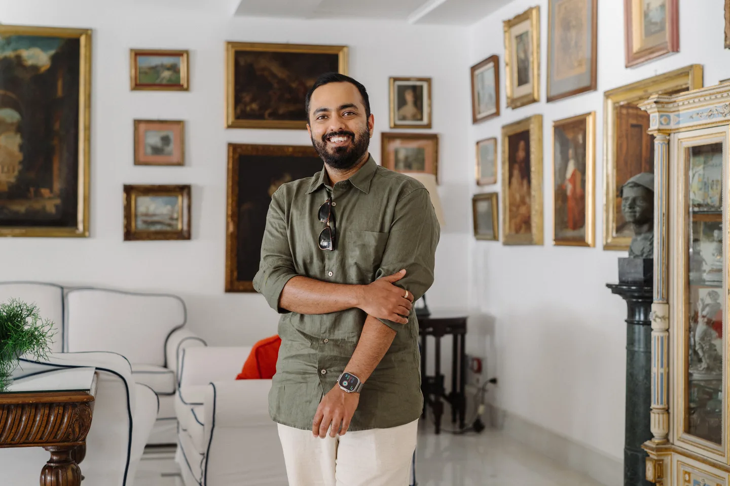 Jatin smiling in the bright hotel lounge
