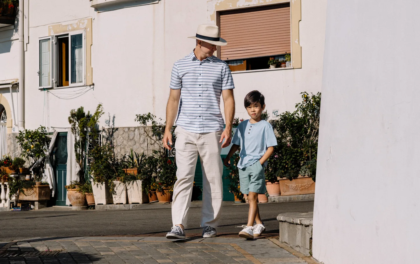 Nick walking through Praiano with his son