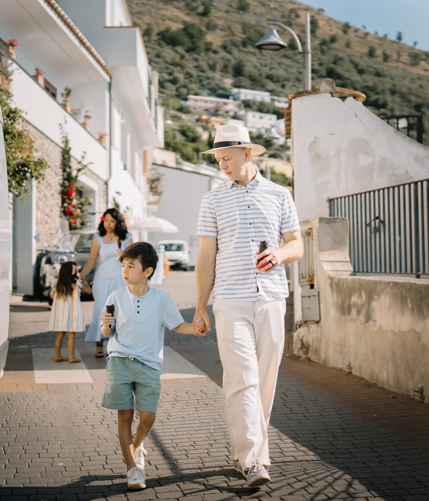 Nick and his son together on the village walk