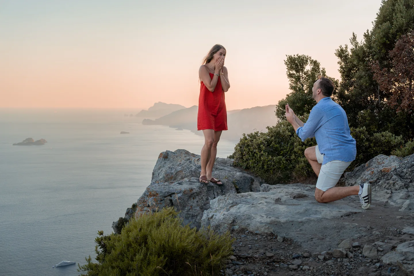 The proposal scene with the distant coastline behind