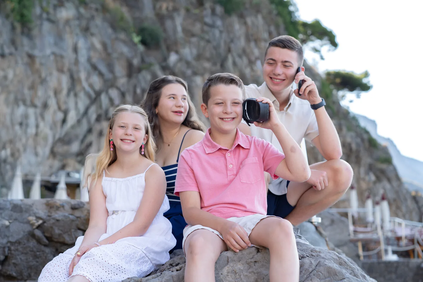 The children together on the beach steps